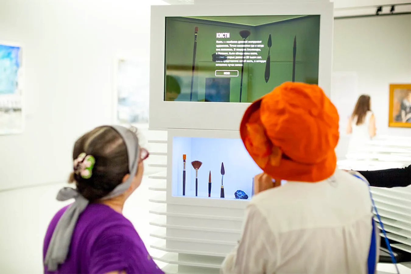 Visitors interacting with the artist tools installation.